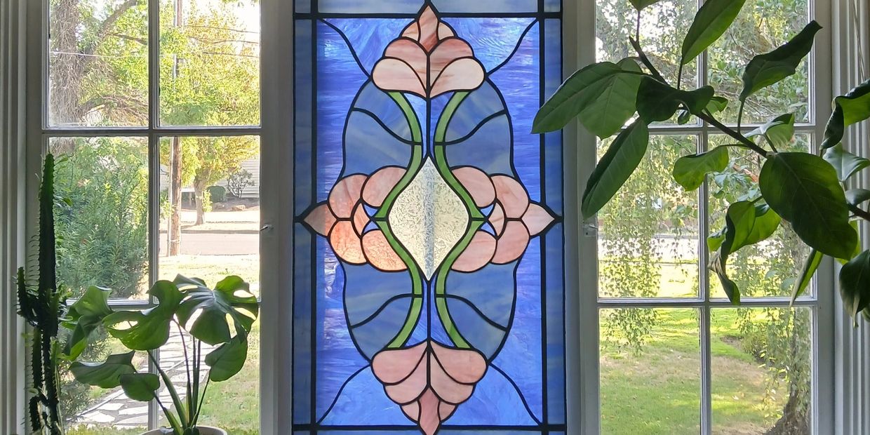 Stained glass window inside Ripple Journeywork’s licensed psilocybin service center in Eugene, OR.
