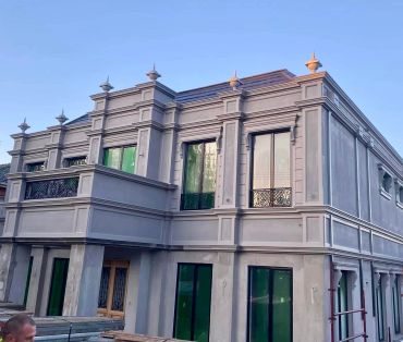 Newly constructed modern two-story building exterior.