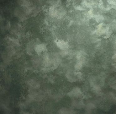 Green textured wall with a cloudy pattern.