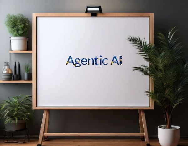 Whiteboard with 'Agentic AI' text in a modern office setting.