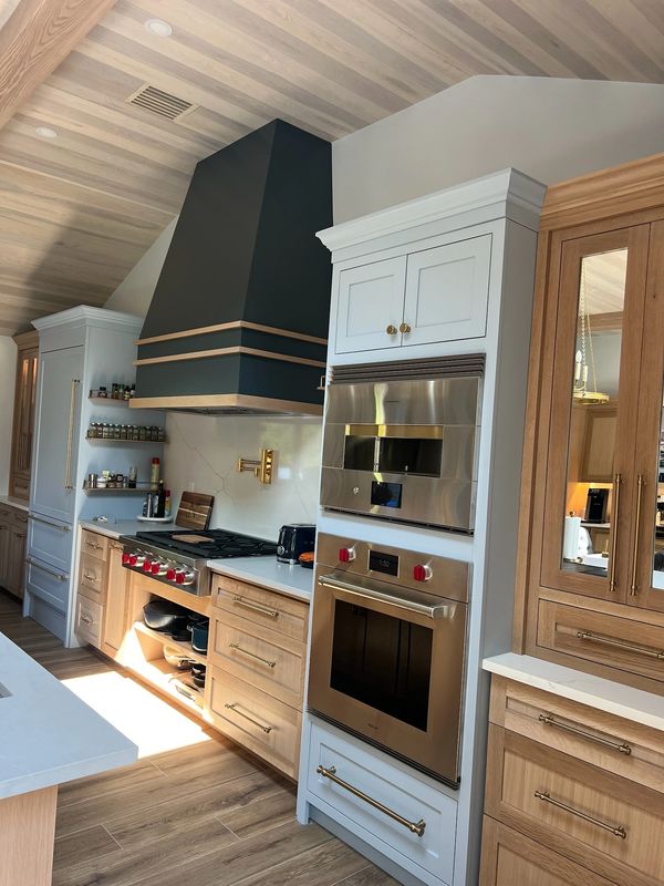 project in Westchester County  shaker-style doors, white oak wood accents, and quartz stone. 