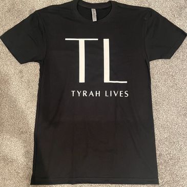Black t-shirt with TL and Tyrah Lives text.