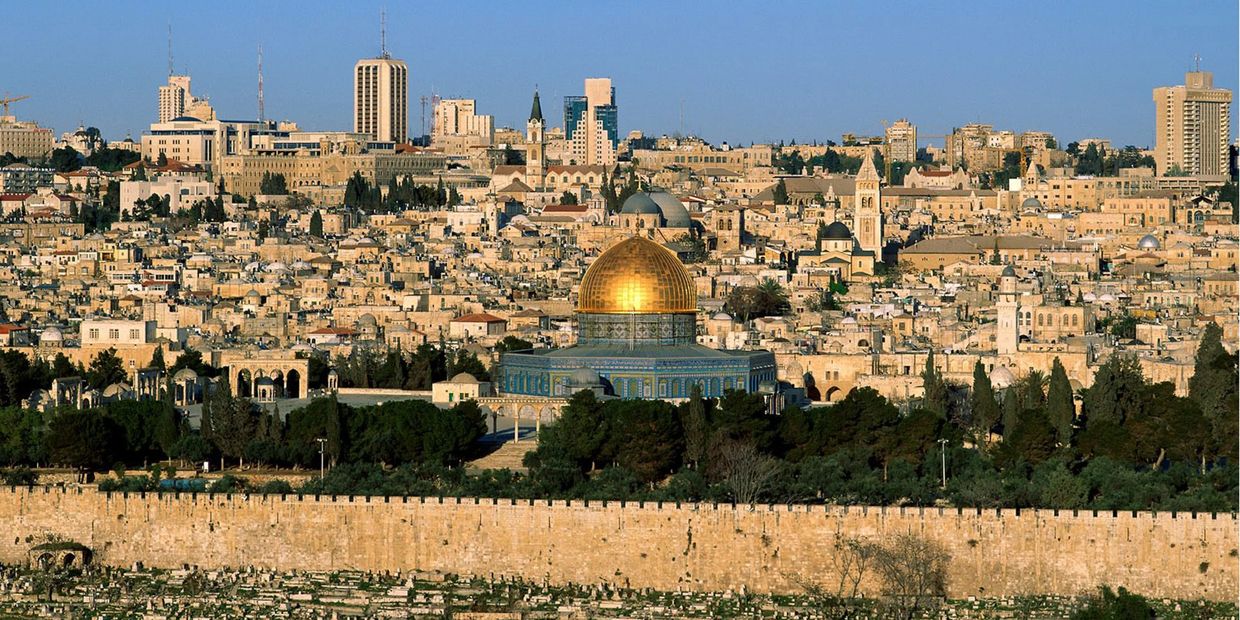 Panoramic view of Jerusalem with the iconic golden Dome of the Rock.