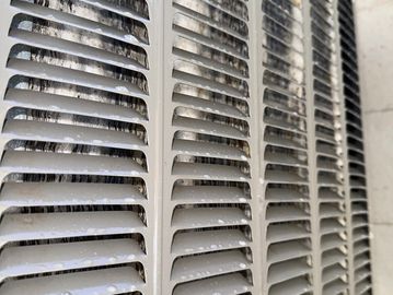 Cleaning condenser coil to improve efficiency. 
