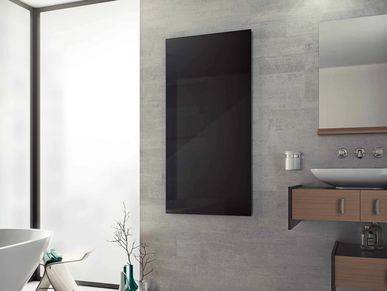 Modern bathroom with sleek design and wooden accents.