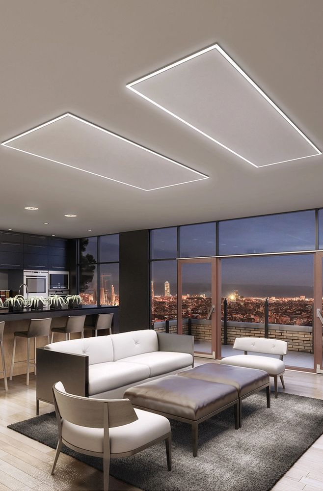 Modern living room with panoramic city views and minimalist furniture.