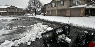 Snow plow at a commercial snow site
