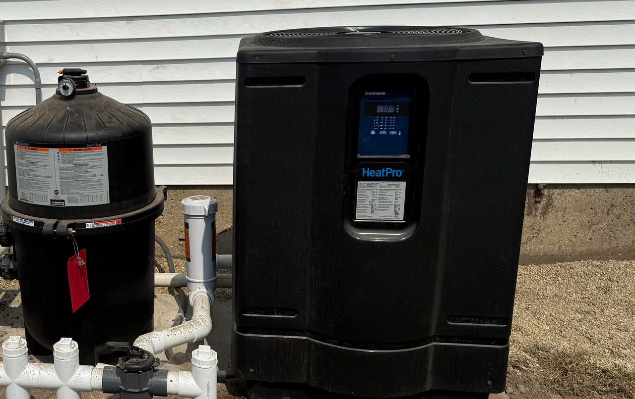 Pool heater installation by Illinois Valley Pool Service