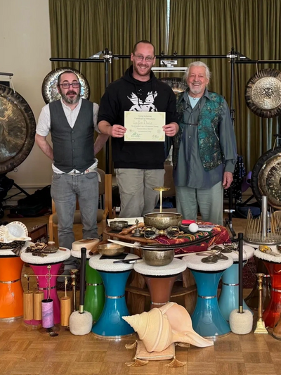 Aiden mcintyre presenting certificate for gong master training
