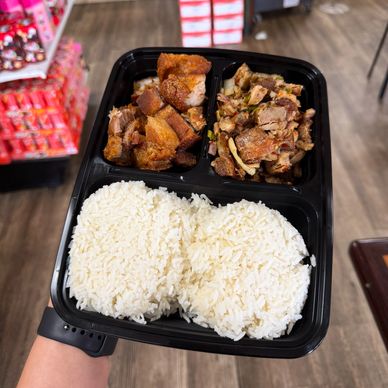 Takeout meal with crispy pork, chopped meat, and white rice in a black container.
