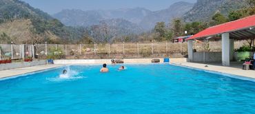 Swimming at Balaut Resort Nainital (Village Suryajala)
