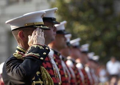 Group of soldiers doing salute