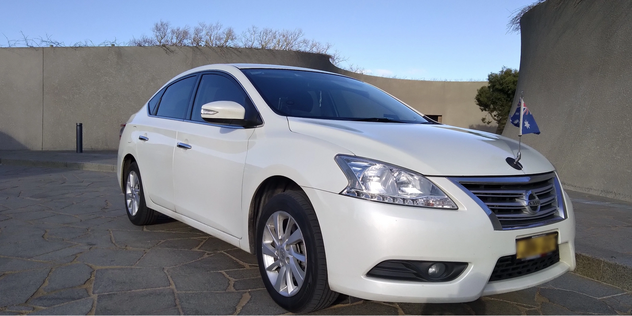 white car with an Australian flag