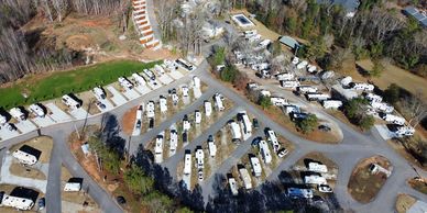 Aerial view of RVs parked at Commerce Station RV Resort, spacious Georgia camping spots.