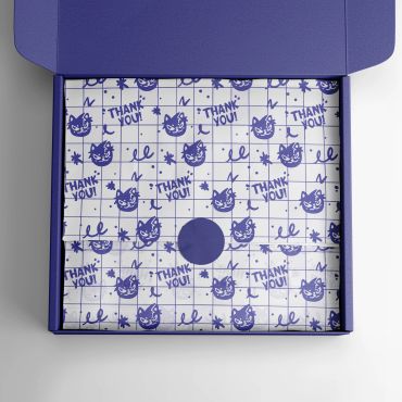 Open box with thank you pattern wrapping paper.