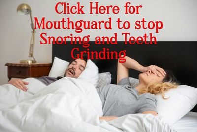 2 people in bed male is snoring and female is awake with her hand on her head in grief