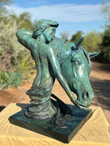Girl and horse bronze sculpture