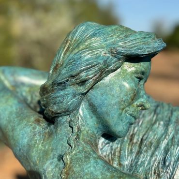 To Love and Cherish bronze sculpture of girl and horse finished in contemporary bronze patina.