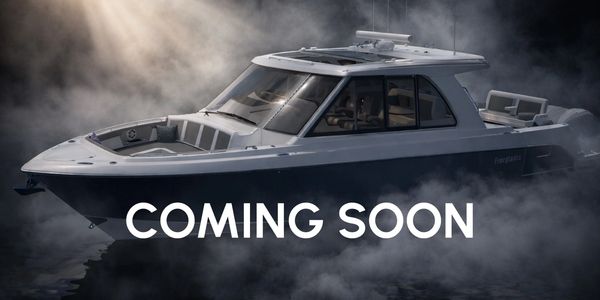 Sleek boat with 'Coming Soon' text overlaid.