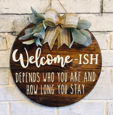 Welcome-ISH, Depends who you are and how long you stay :) Rustic Wood Round with Burlap and Lace