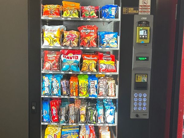 Snack vending machine with meal options. 