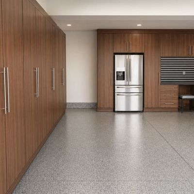 Modern kitchen with wooden cabinets and stainless steel refrigerator.
