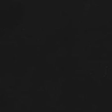 Dark, mostly black image with indistinct shapes.