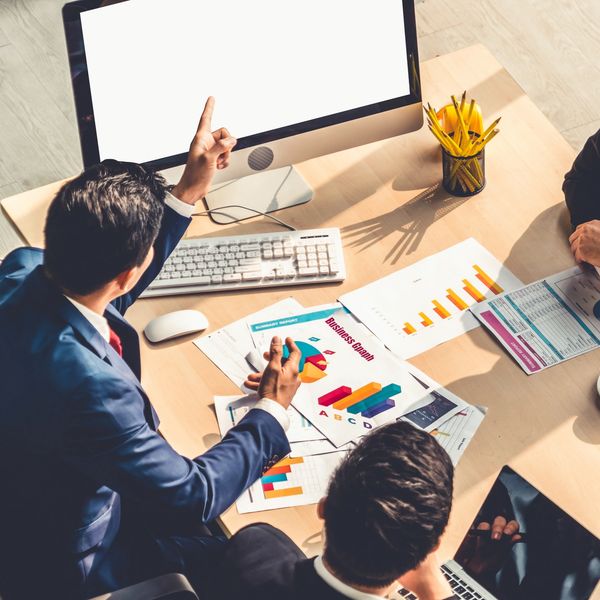 cybersecurity experts discussing strategic planning with clients