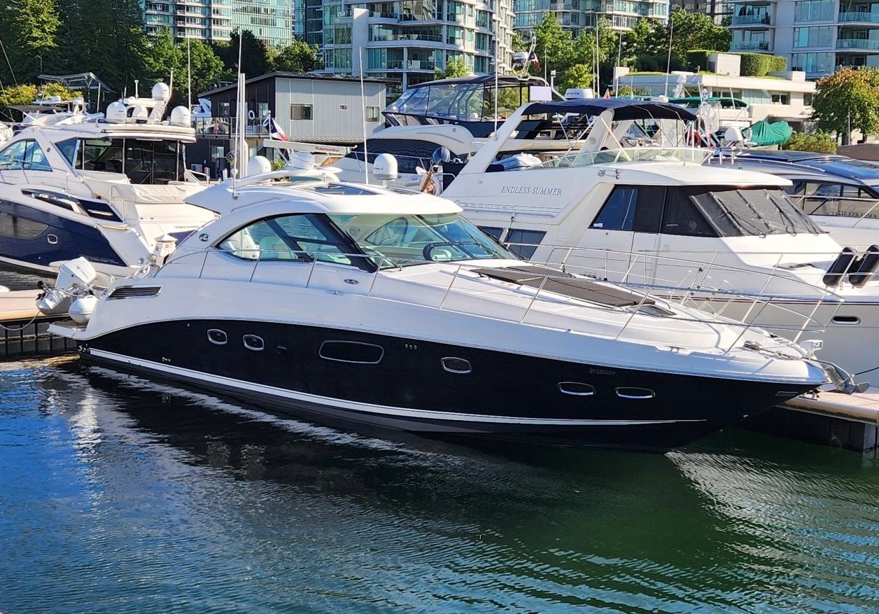 A luxury yacht docked at a marina.