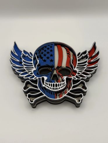 Skull with American flag colors and wings.