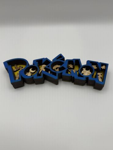 3D Pokémon logo with small beige Pokémon figures inside.