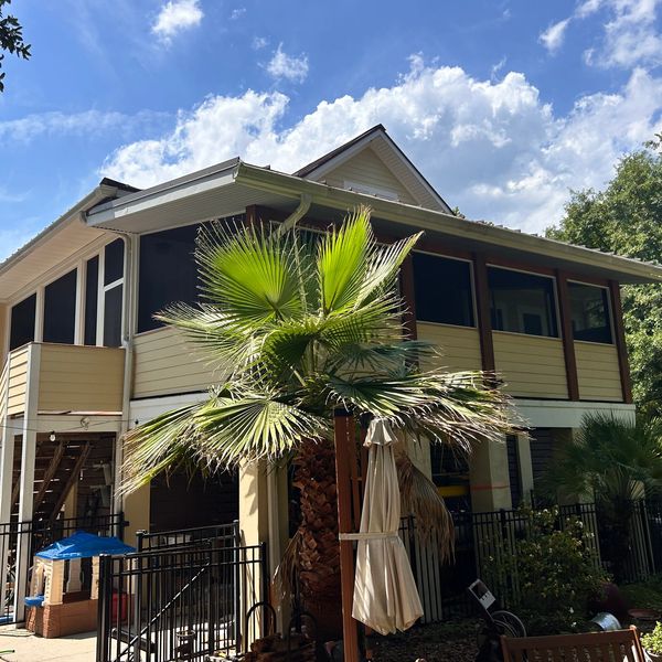 Second story porch enclosure.