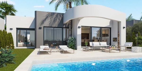 Modern house with pool and outdoor seating.