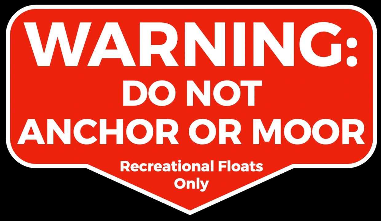 Red warning sign stating no anchoring or mooring for recreational floats only.