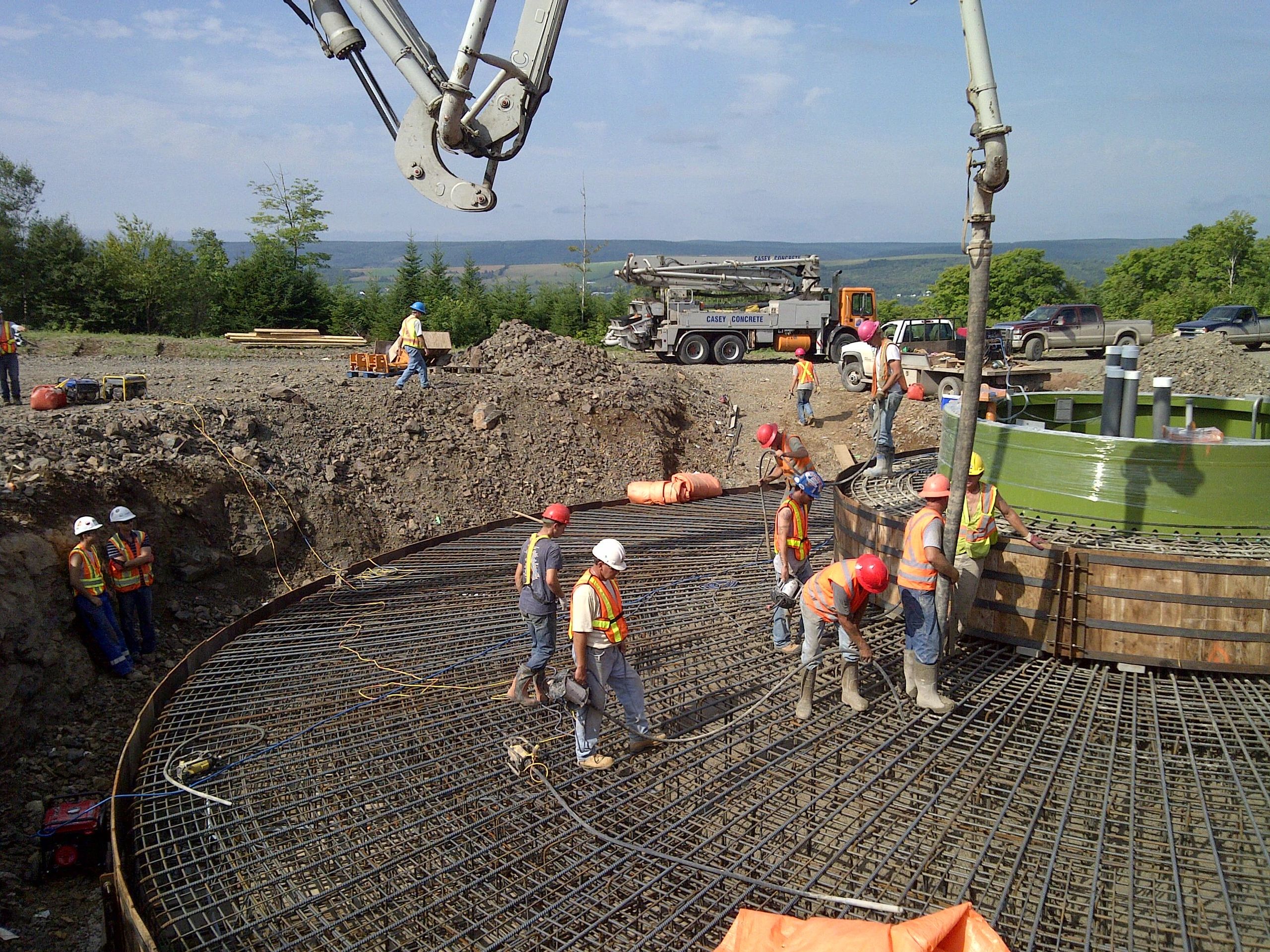 Photo of pouring a foundation for a windmill base.