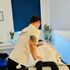 Carlos providing deep tissue work on the lower body.