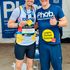 Carlos with runner at the TCS 2025 London Marathon tent, providing expert post-race sports massage.