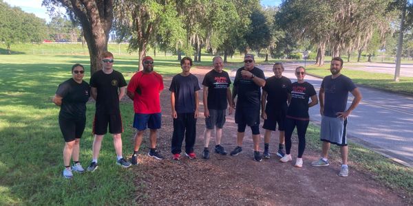 Group of high ranking Krav Maga students as they prepare to run some miles on the path,