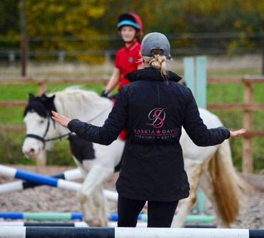 Equestrian logo in action