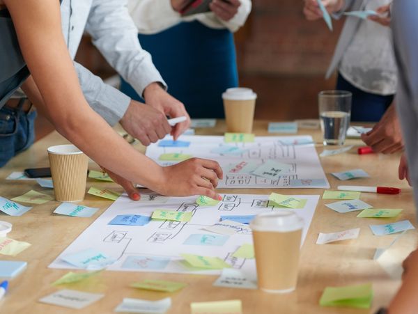 A team of people brainstorming ideas
