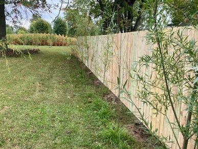 Wood Privacy Fencing to define space and still provides a great looking area.