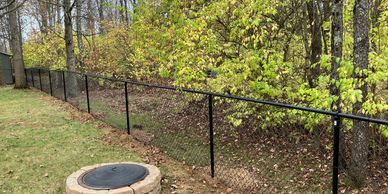 Black Chainlink defines your yard, while allowing you to keep your property's impressive view
