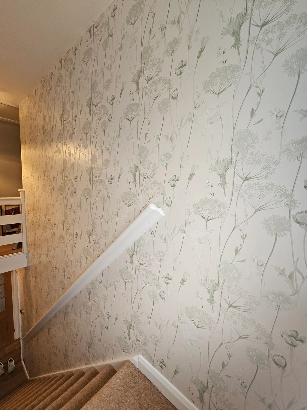 Catherine Lansfield Meadowsweet floral wallpaper in sage green.