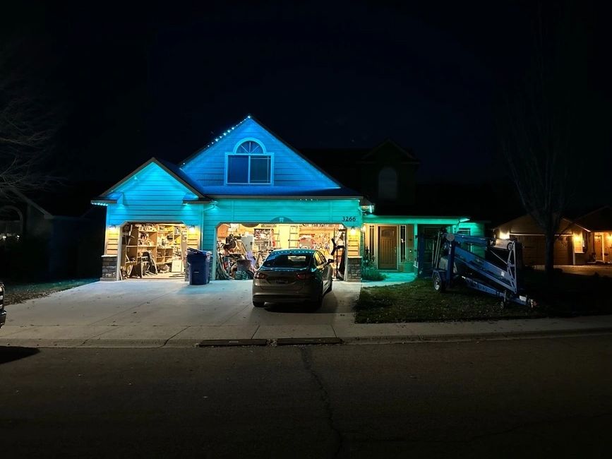 Home with permanent lights being tested at night