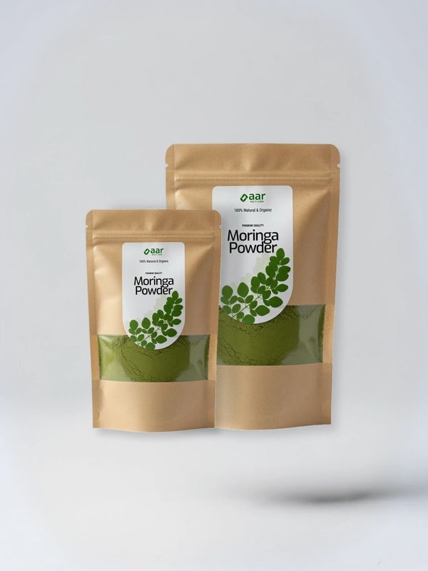 Two brown pouches of organic Moringa powder with green leaf design.