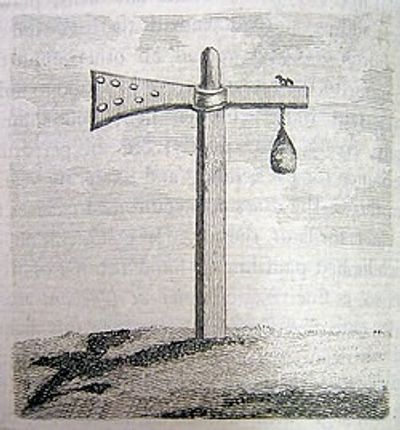 A surreal drawing of a pole with a horn, a hanging weight, and shadows on the ground.