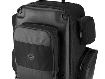 Black multi-pocket backpack with padded compartments.