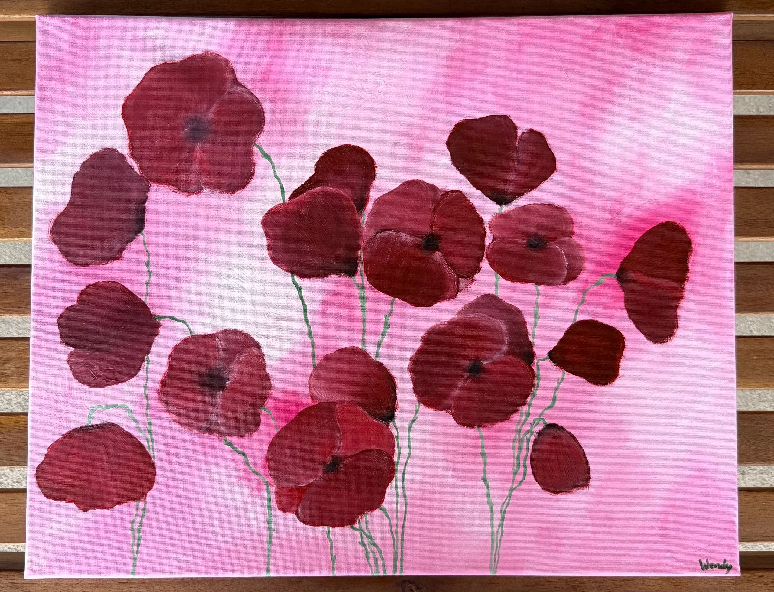 Painting of red flowers on a pink background.