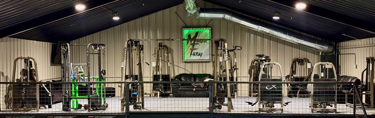 Stack of books next to pencils in a holder and a camera.