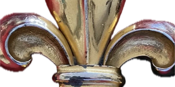 Fleu de lis means "lily flower in French, is a stylized lily symbol  associated with French royalty.